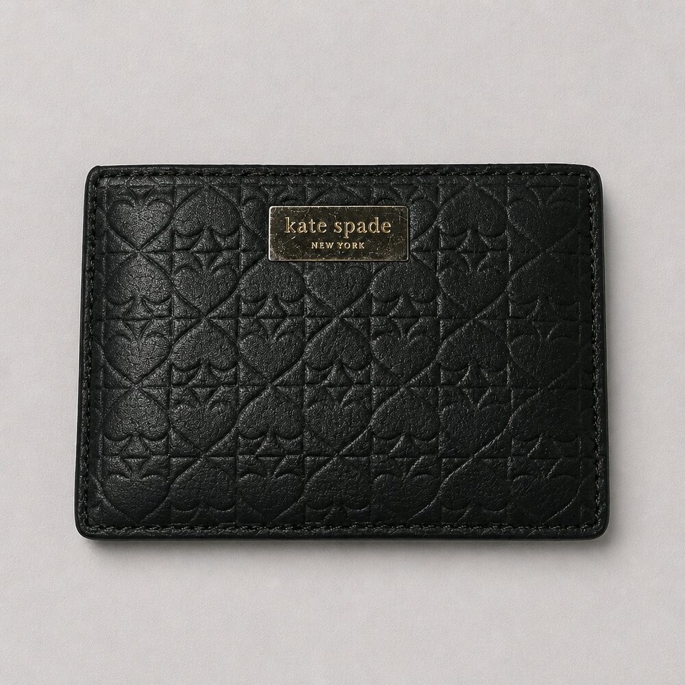 kate spade black leather card holder embossed hearts and spades pattern